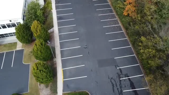 Nothing like fresh sealcoat and bright stripes to make a parking lot feel brand new again.

#millikencorp #themillikencorpoation #sealingandstriping